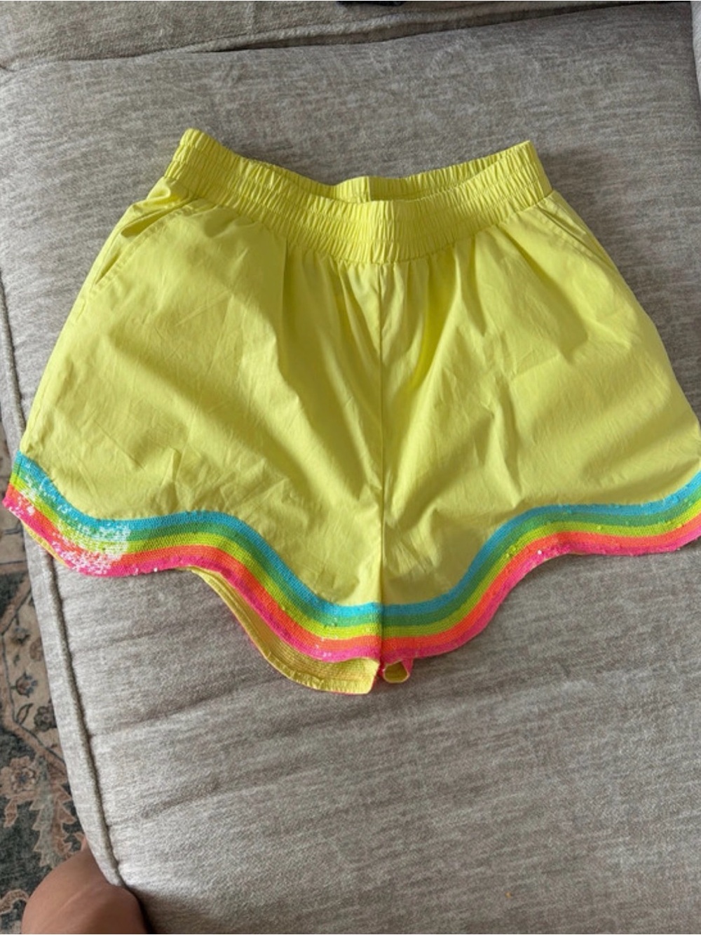 QUEEN OF SPARKLES Neon Yellow Athletic Shorts with Rainbow Hem